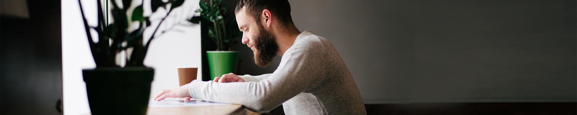man reading news